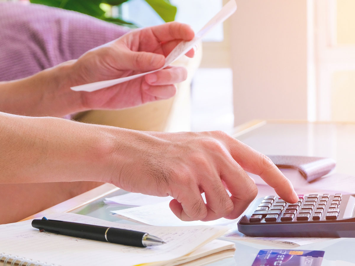 someone calculating their cash flow