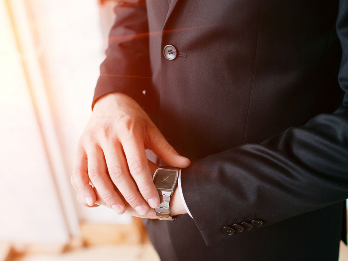 someone looking at their watch