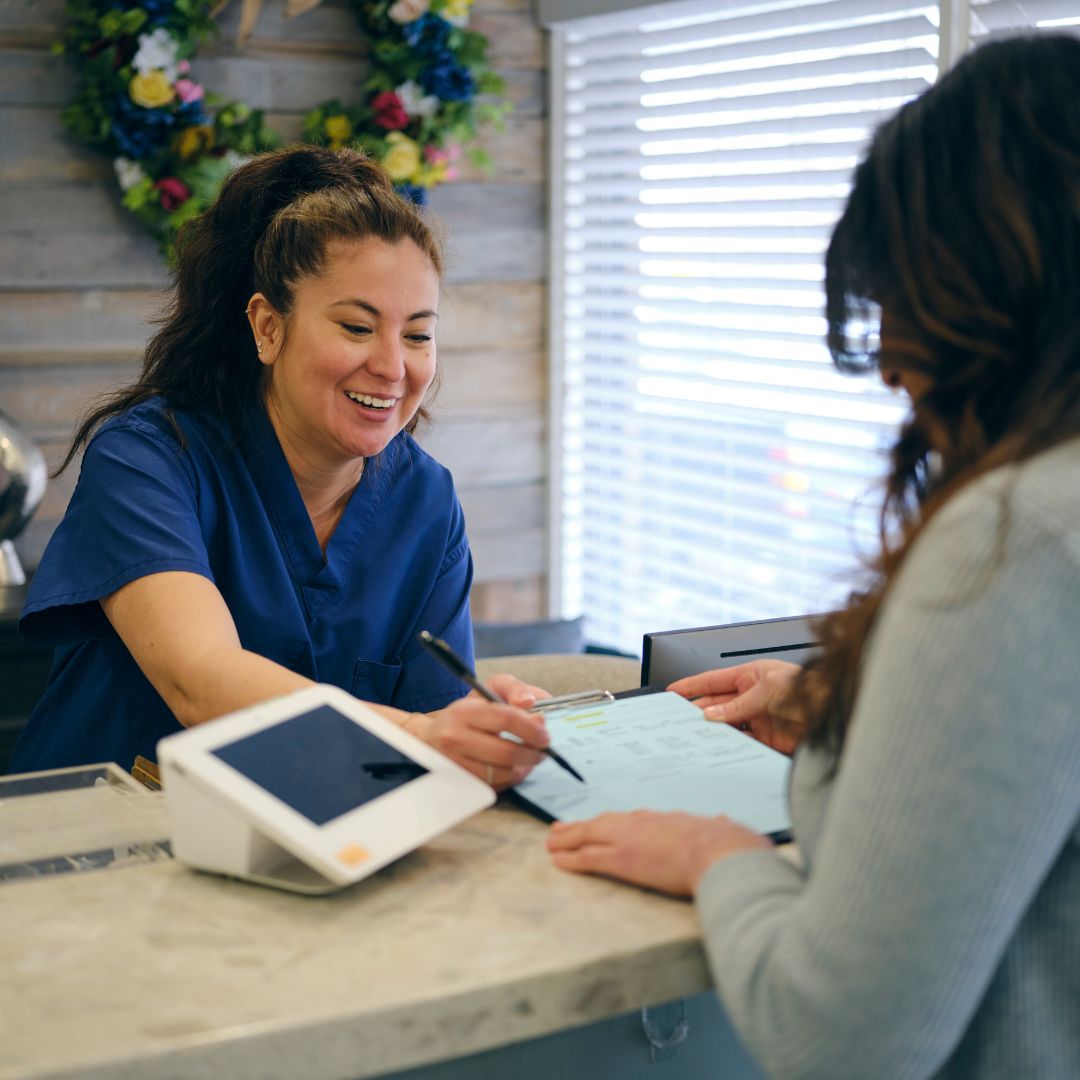 dentist assistant helping patient