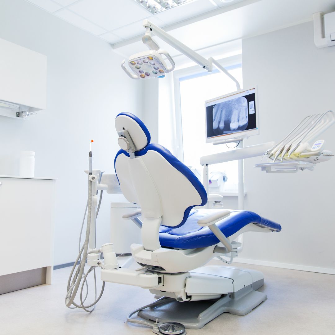 a dental room with a dental chair
