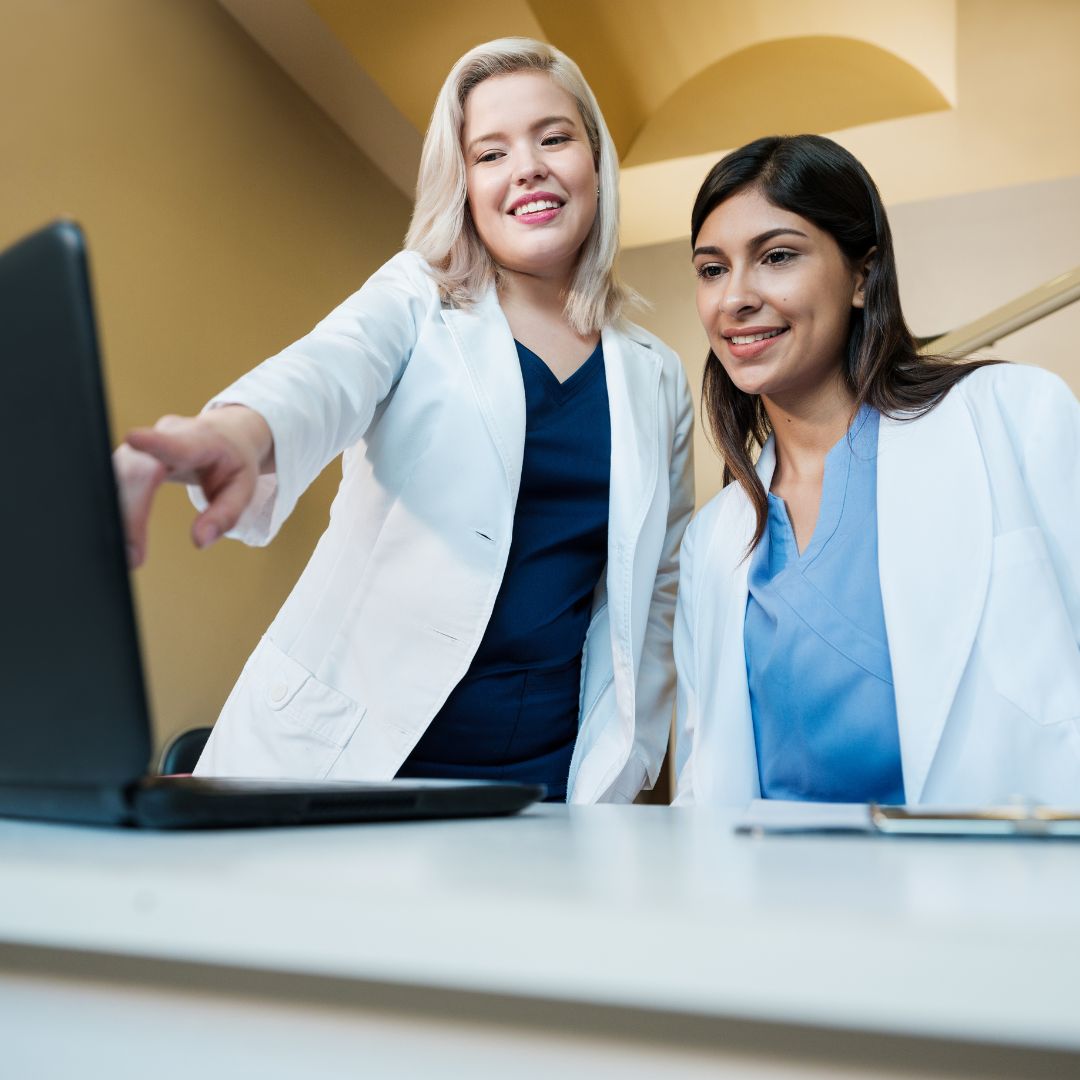 dental staff looking at computer screen