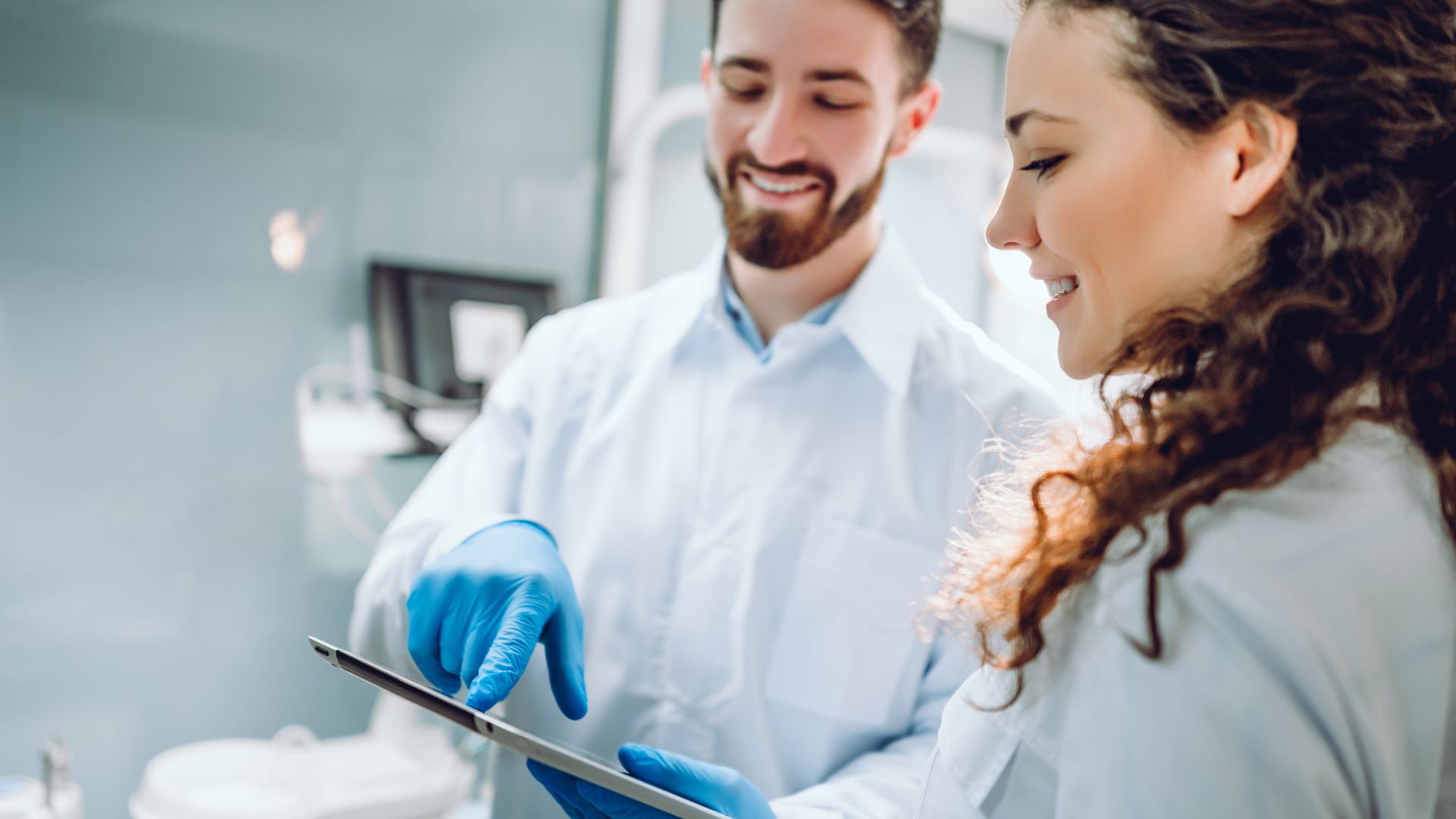 dentists looking at tablet